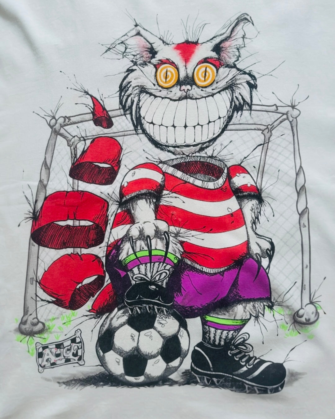 90s Alice's Adventures in Wonderland "CHESHIRE CAT soccer" Tshirt